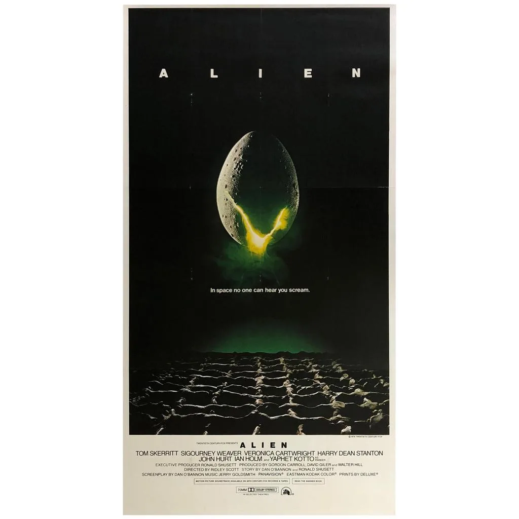 Alien poster artwork shows a cracked, glowing egg above a dark surface.
