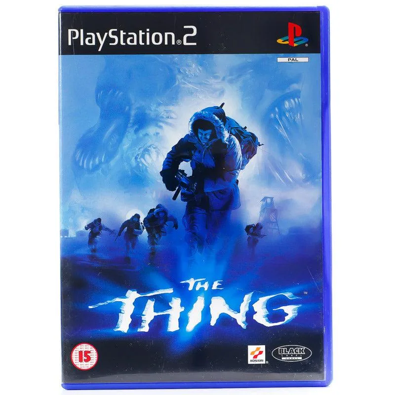 The PlayStation 2 box for The Thing shows figures moving through a frozen blue landscape.