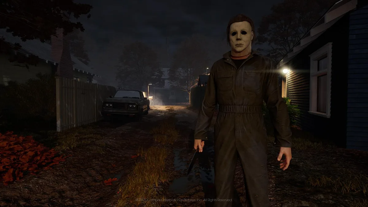 Michael Myers stands on a suburban street in promotional imagery for the modern Halloween game.