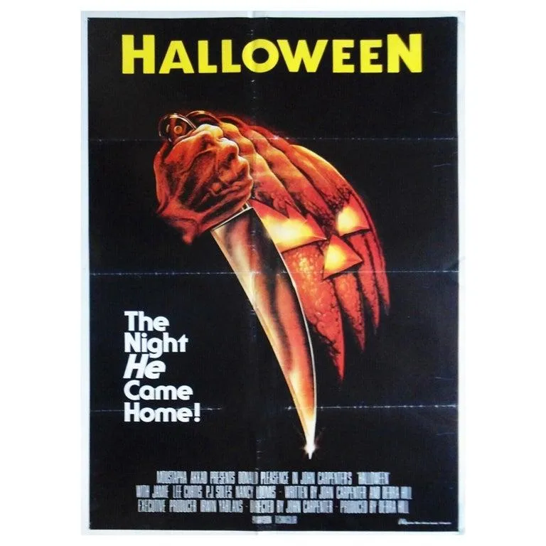 Halloween poster artwork with a knife and a glowing jack-o-lantern.